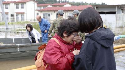 Rescuers Slog Through Mud as Japan Typhoon Death Toll Rises To 66