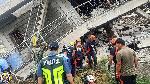 Emergency crew engages in rescue activities outside a building that collapsed during the earthquake, in La Trinidad, Benguet, Philippines July 27, 2022. Public Information Service-Bureau of Fire Protection /Handout via REUTERS