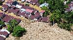 Stacked timber logs in a residential area in Tabiang Bandang Gadang, Nanggalo, Padang, West Sumatra, Indonesia, December 9, 2025. Antara/Iggoy el Fitra