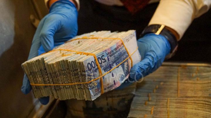 BI dan Polri Musnahkan 466 Ribu Lembar Uang Rupiah Palsu