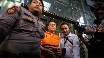 Silmy Karim (center, wearing orange vest).